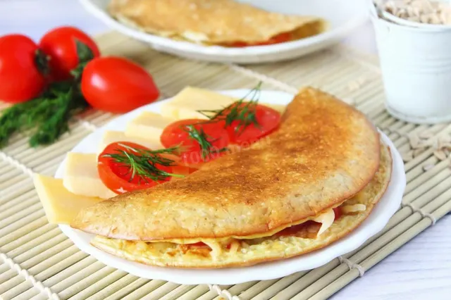 Овсяноблин с томатом и сыром